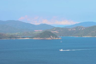 22 May 2005  green islands surrounded by the blue ocean. Port Shelter