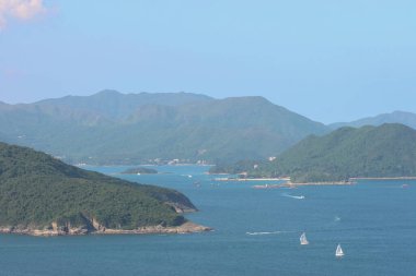 22 May 2005  green islands surrounded by the blue ocean. Port Shelter
