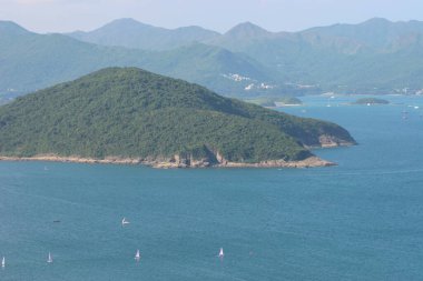22 May 2005  green islands surrounded by the blue ocean. Port Shelter