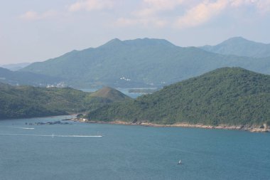 22 May 2005  green islands surrounded by the blue ocean. Port Shelter