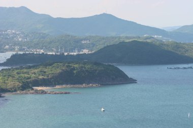 22 May 2005  green islands surrounded by the blue ocean. Port Shelter