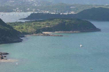 22 May 2005  green islands surrounded by the blue ocean. Port Shelter