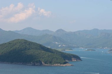 22 May 2005  green islands surrounded by the blue ocean. Port Shelter