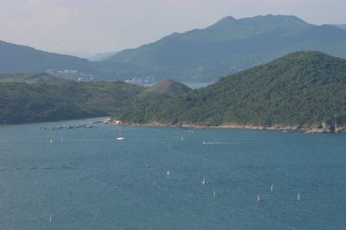22 May 2005  green islands surrounded by the blue ocean. Port Shelter
