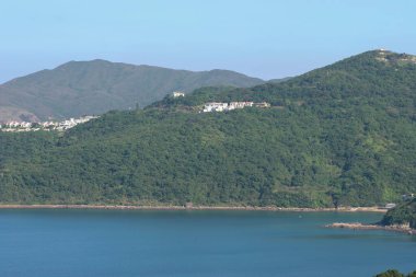22 May 2005  green islands surrounded by the blue ocean. Port Shelter
