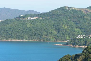22 May 2005  green islands surrounded by the blue ocean. Port Shelter