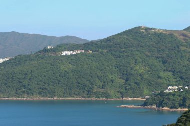 22 May 2005  green islands surrounded by the blue ocean. Port Shelter