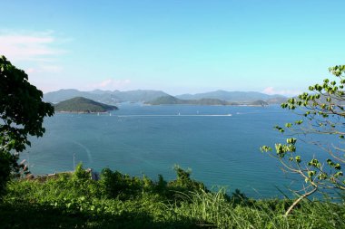 22 May 2005  green islands surrounded by the blue ocean. Port Shelter