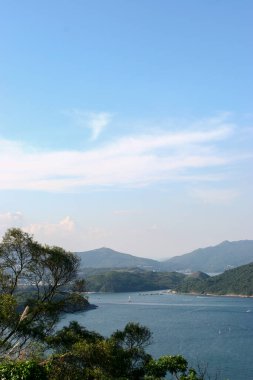 22 May 2005  green islands surrounded by the blue ocean. Port Shelter