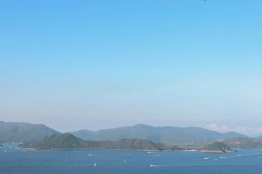 22 May 2005 located at Port Shelter , Beautiful green islands surrounded by the blue ocean.