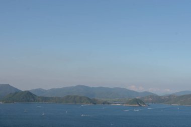 22 May 2005 located at Port Shelter , Beautiful green islands surrounded by the blue ocean.