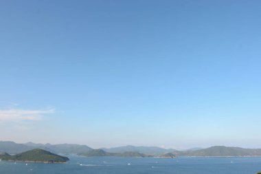 22 May 2005 Port Shelter , Beautiful green islands surrounded by the blue ocean.