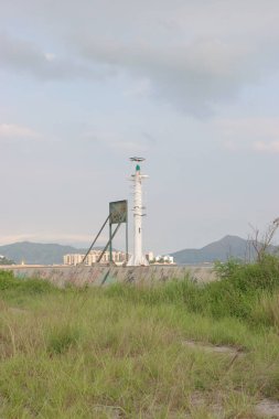 11 Haziran 2005 'te Castle Peak Körfezi Rıhtım Alanı' ndaki deniz fenerinde.