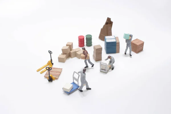 Mini Worker Figure Move Products — Stock Photo, Image