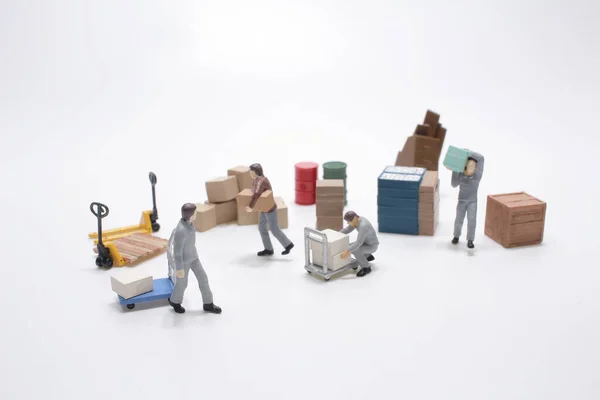 Mini Worker Figure Move Products — Stock Photo, Image