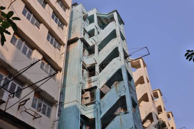 27 Mart 2021 'de Wing Kwong caddesindeki Kentsel yenilenme altındaki eski apartman Kwa Wan' a.