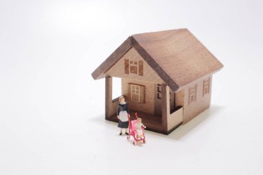 a mini Beautiful chambermaid in uniform take care baby