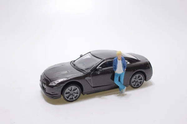 Mini Figura Com Carro Esporte Cor Preta — Fotografia de Stock