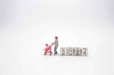 mother with a Baby Stroller, new year planning Concept 