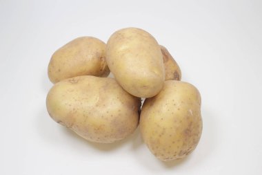 the photo of Potato tubers on a white background