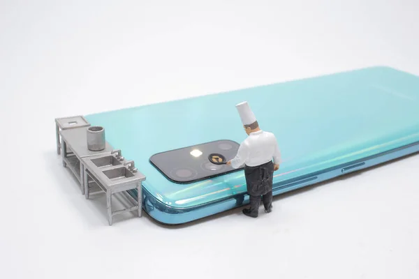 Mini Chef Cocking Mobile Phone Lens — Stock Photo, Image