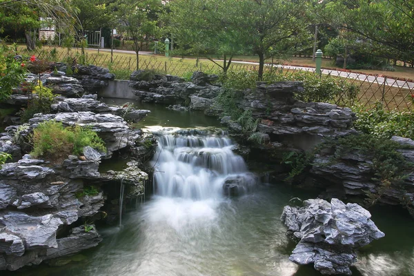 flowing waterfall at Lingnan Chinese Garden, Hong Kong