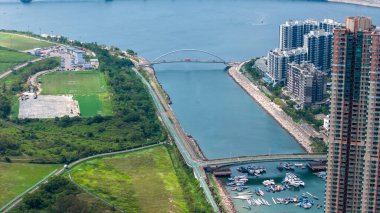 A playful miniature set shows cheerleaders performing
