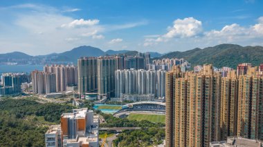 Modern coastal district with parks and skyline views
