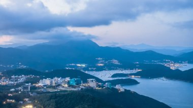 Modern university architecture and coastal scenery in Hong Kong