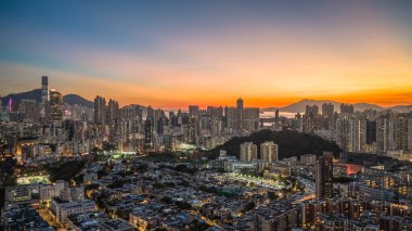 Evening cityscape of Kowloon skyline during twilight