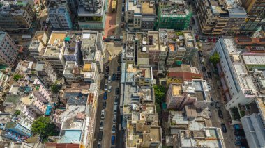 Kowloon 'daki eski apartman mimarisi ve sokak hayatı