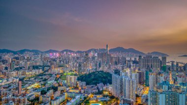 Upscale urban neighborhood glowing in evening lights