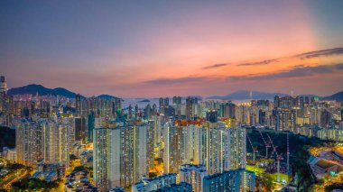 Upscale urban neighborhood glowing in evening lights