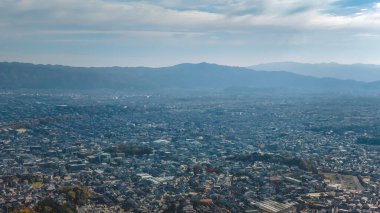Elevated urban view across Kyoto's northern district skyline Nov 24 2025