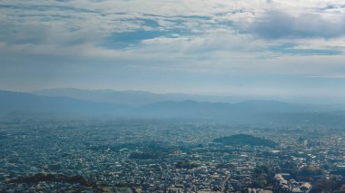 Elevated urban view across Kyoto's northern district skyline Nov 24 2025