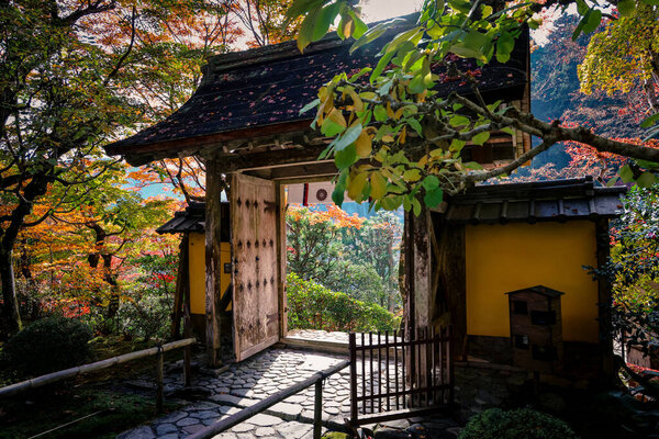 Peaceful Buddhist temple surrounded by lush mountain nature Nov 23 2025