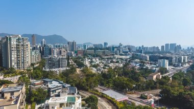 Açık gündüz ışığı Kowloon Tong kuzey binaları ve çevresini vurguluyor: 15 Ocak 2026