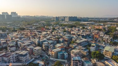 16 Ocak 2026 'da Kam Sheung Demiryolu yakınında sakin bir köy halkı.