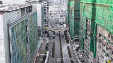 Yeni Akut Hastane inşaatı 8 Şubat 2026 'da Kai Tak siluetine hakim oldu.