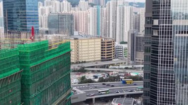 Yeni Akut Hastane inşaatı 8 Şubat 2026 'da Kai Tak siluetine hakim oldu.