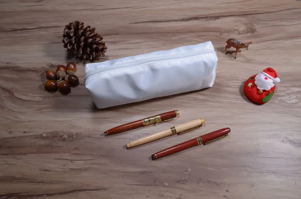 pencil bag on wood table