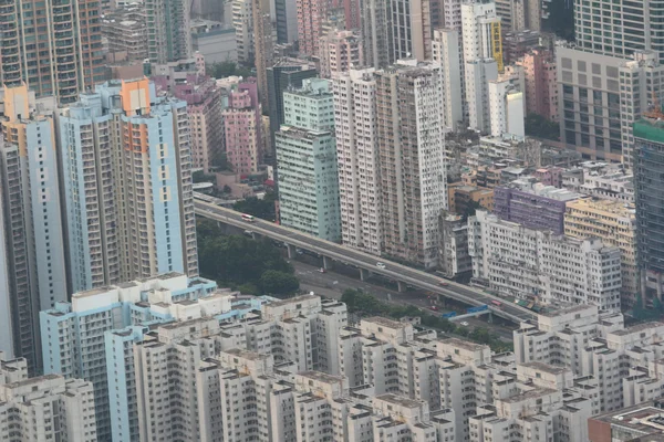 A mérföldkőnek számító épület Kowloon utca-és városrészlet — Stock Fotó