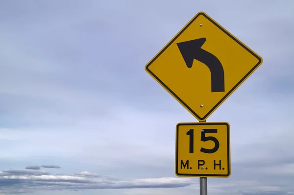 Sinal de curva de 15 mph — Fotografia de Stock