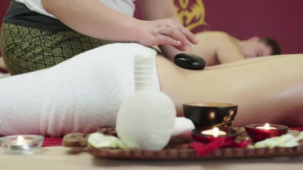 Beautiful Young Brunette Girl Having Stone Massage — Stock Video