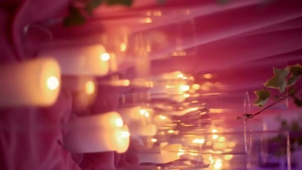 Candles on Pink Background — Stock Video