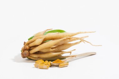 Kaempferia tıbbi bir bitkidir. Sıcak ve acı bir tadı var, mide ağrısını, şişkinliği, hazımsızlığı, toniği, cinsel iktidarsızlığı tedavi etmek için libidoya toniği hafifletiyor. - Evet. Hemoroidler için bir ilaç. Kapsül, sarı hap. 