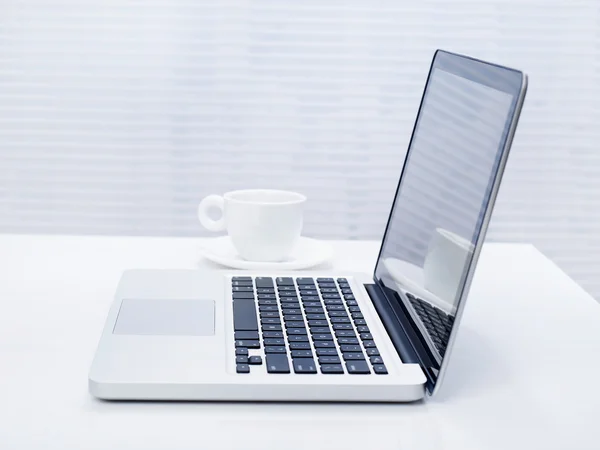 Laptop on desk — Stock Photo, Image