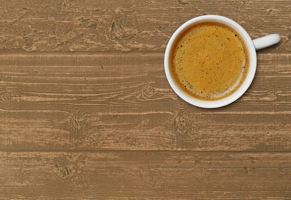 Koffiekopje op hout — Stockfoto