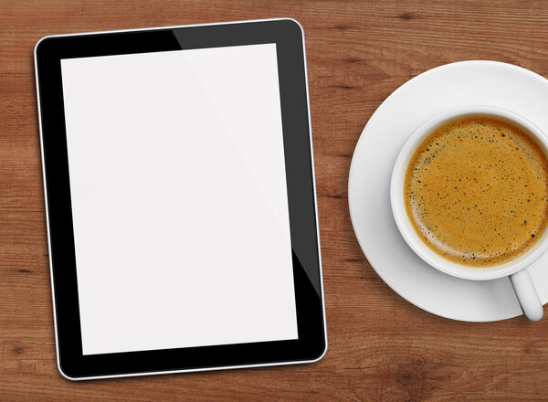 Tablet and coffee cup