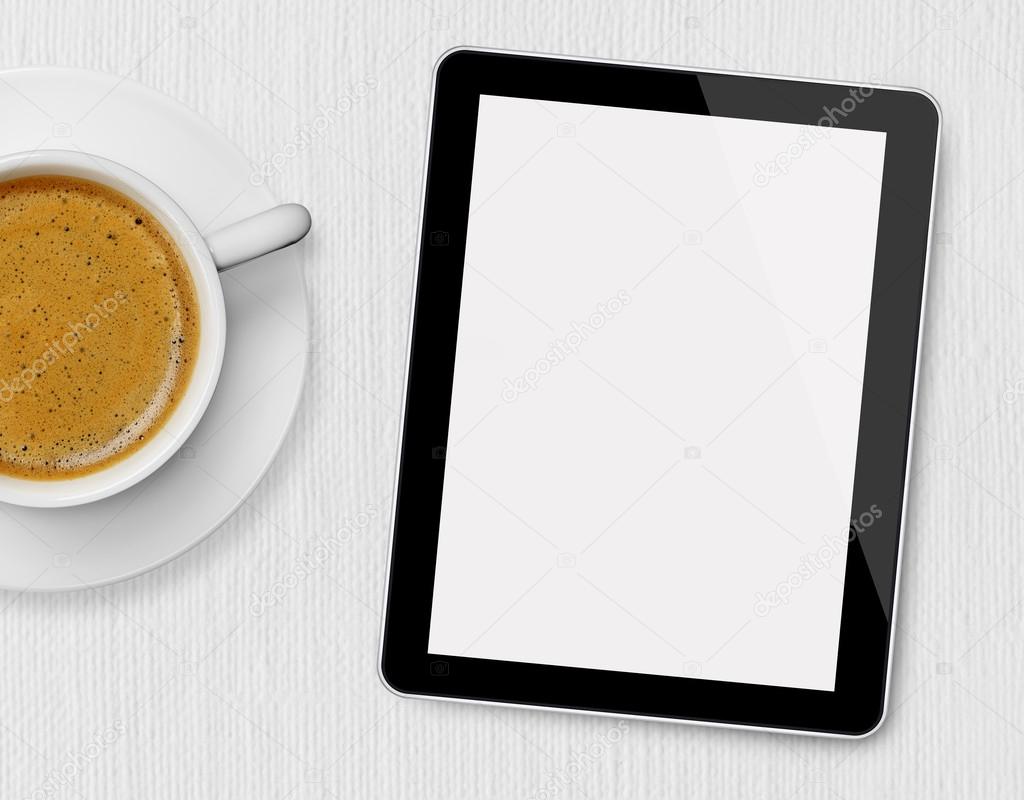 Tablet and coffee cup